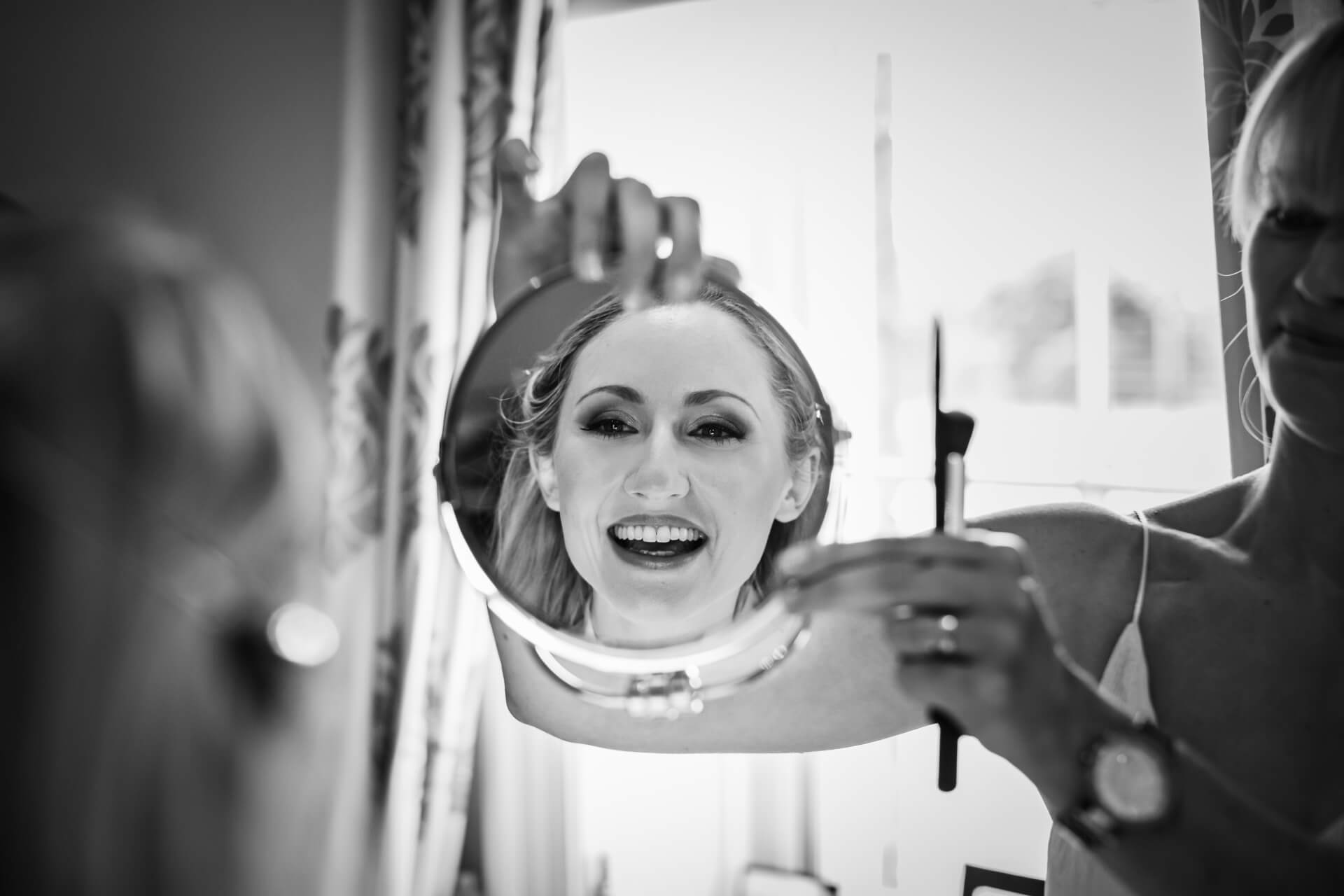 Bride looking in the mirror