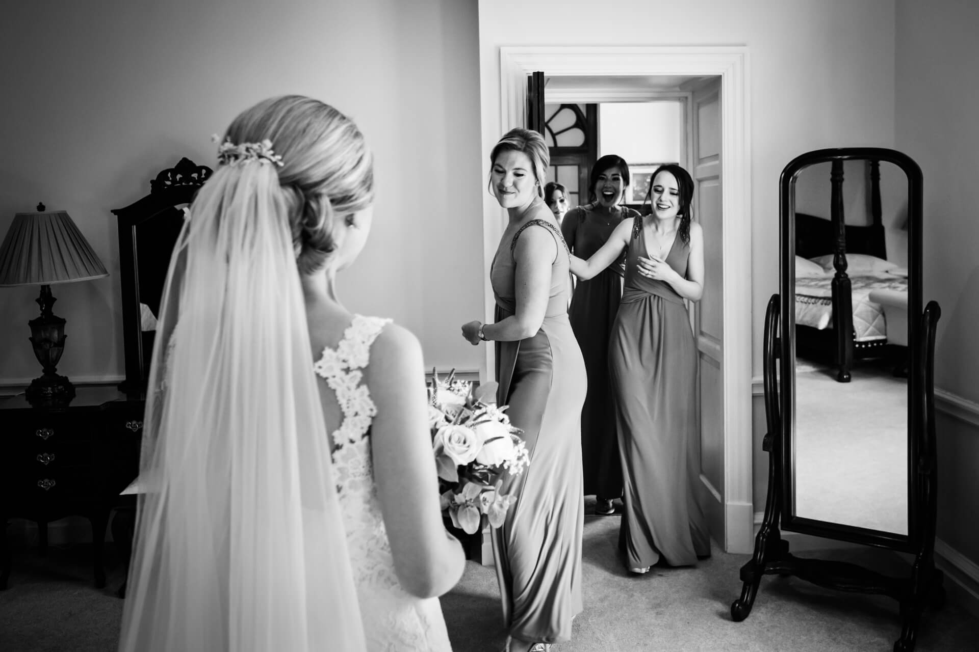 Denton Hall Wedding Photograpy - bridesmaids seeing the bride ready