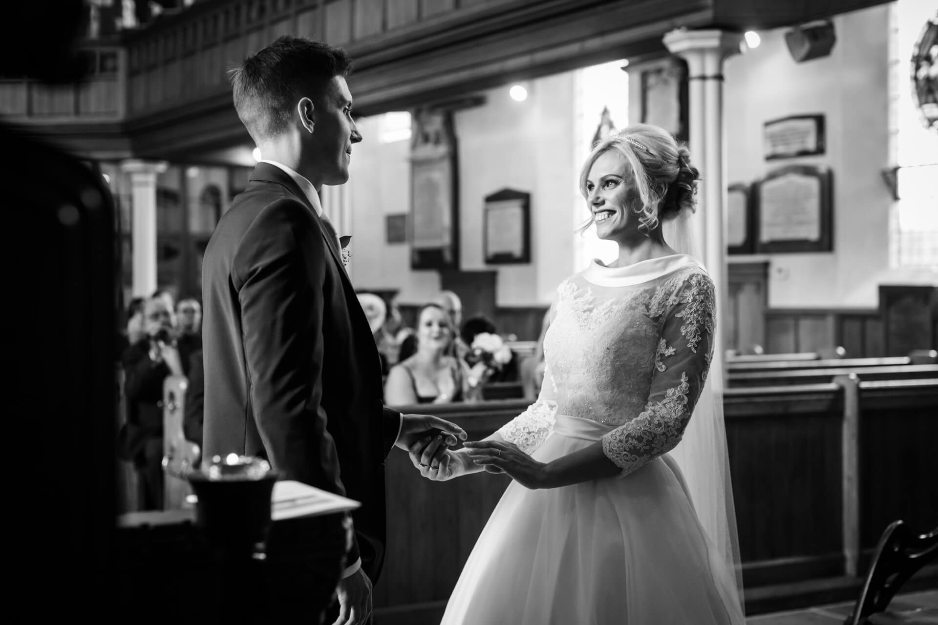 Bride and groom take their vows in a church in Harrogate