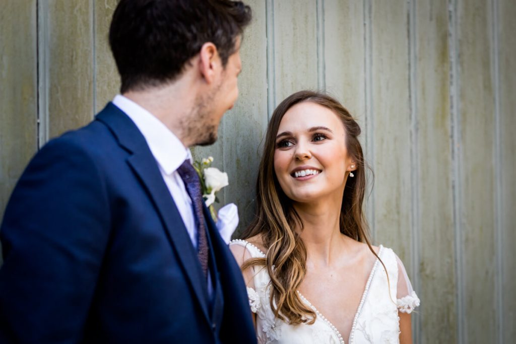 bride looking at the groom