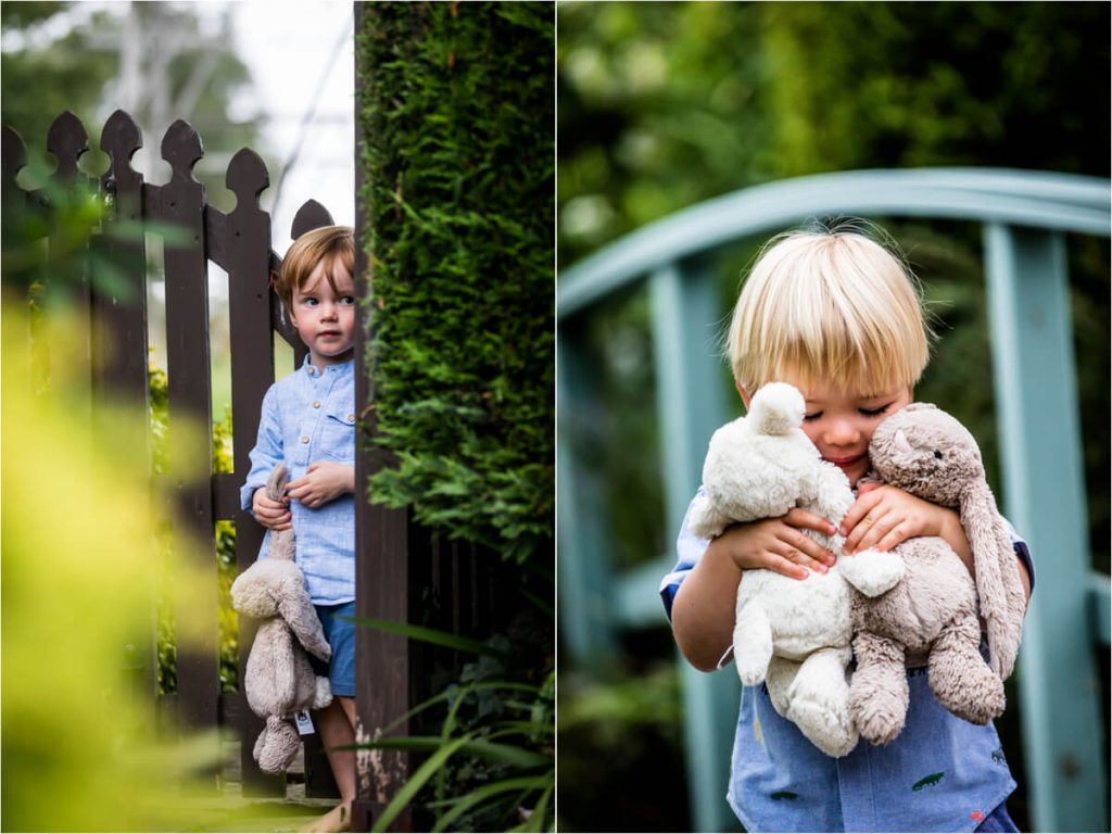 two little boys with their cuddly toys in a Yorkshire garden
