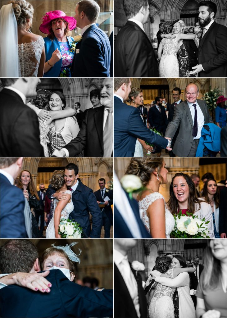 guests greeting the bride and groom as they walk out of Bolton Abbey