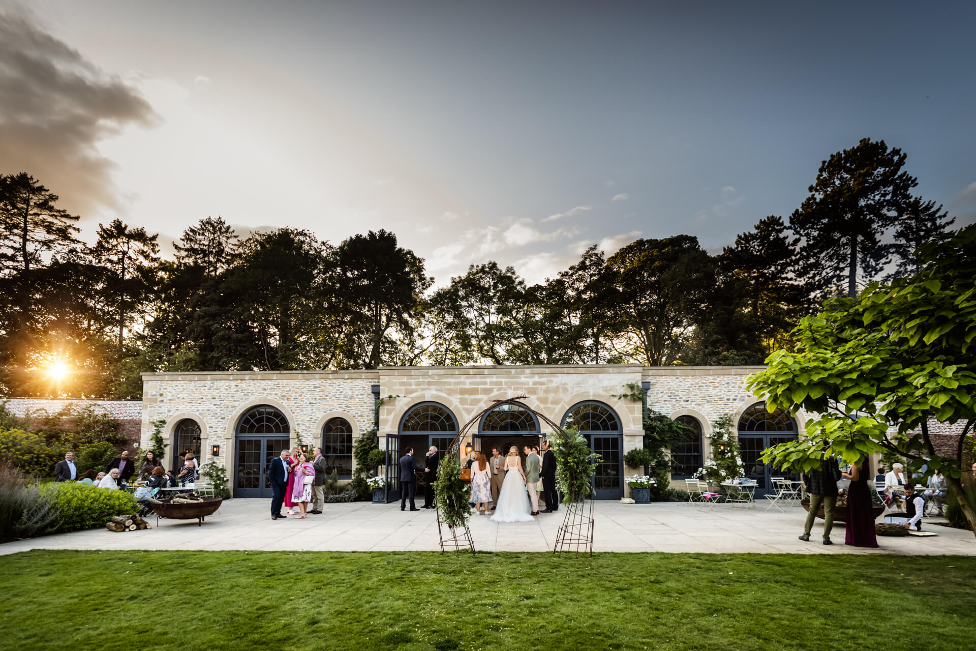 the sun sets on the fig house at Middleton Lodge