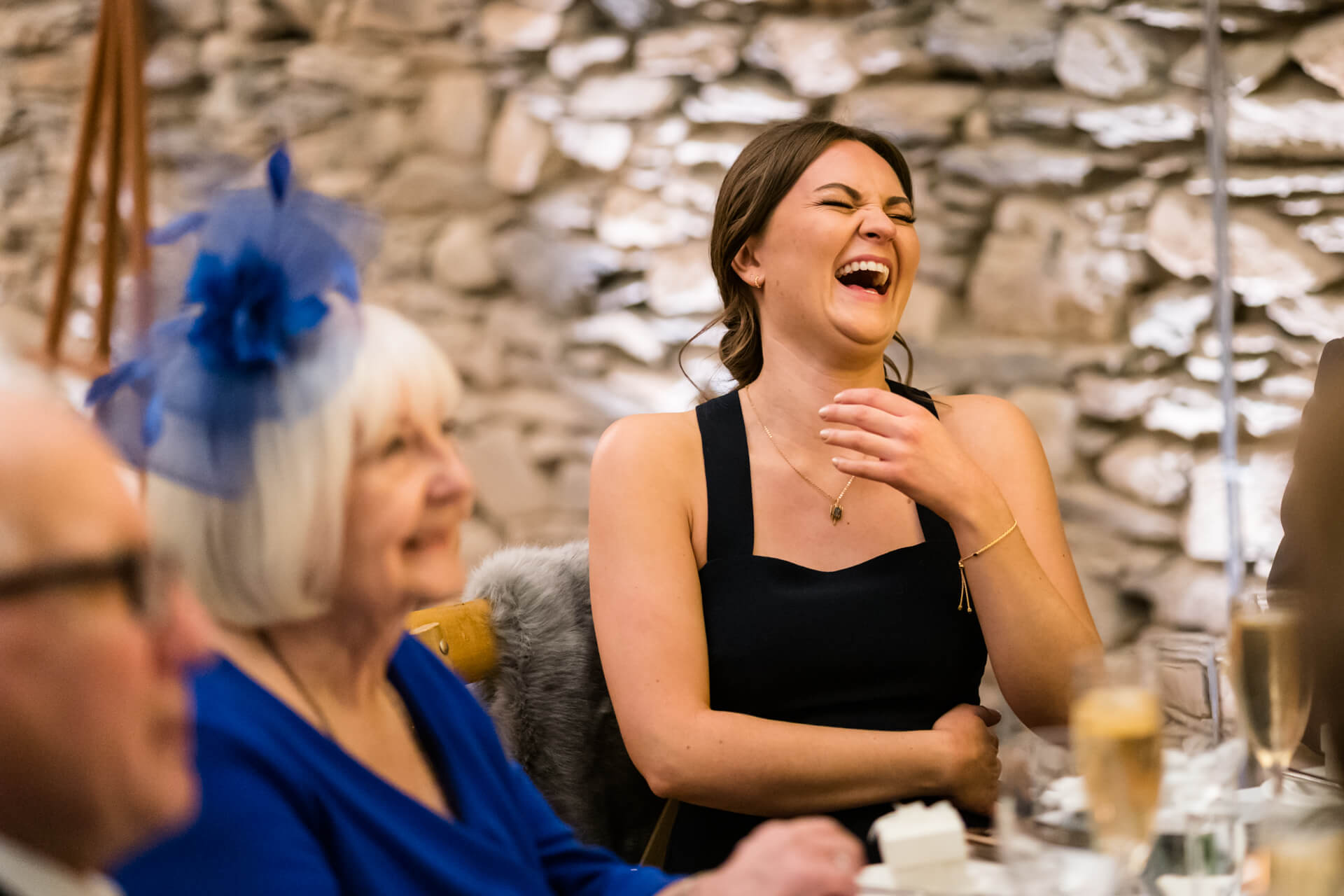 sister of the bride laughing