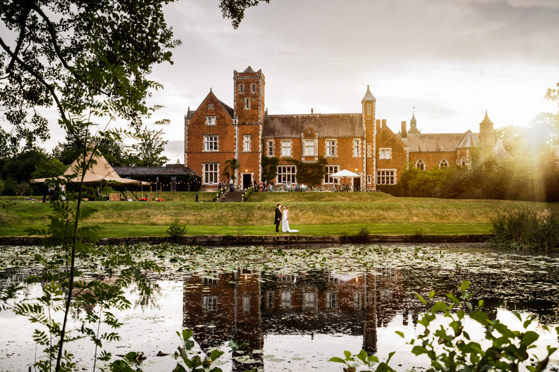 bride and groom in the grounds of Thicket Priory