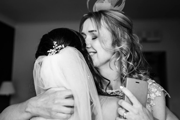 brides mum hugs her daughter