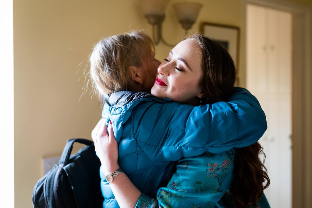 bride hugging her friend
