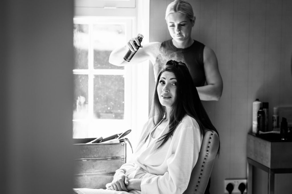 bride having her hair done