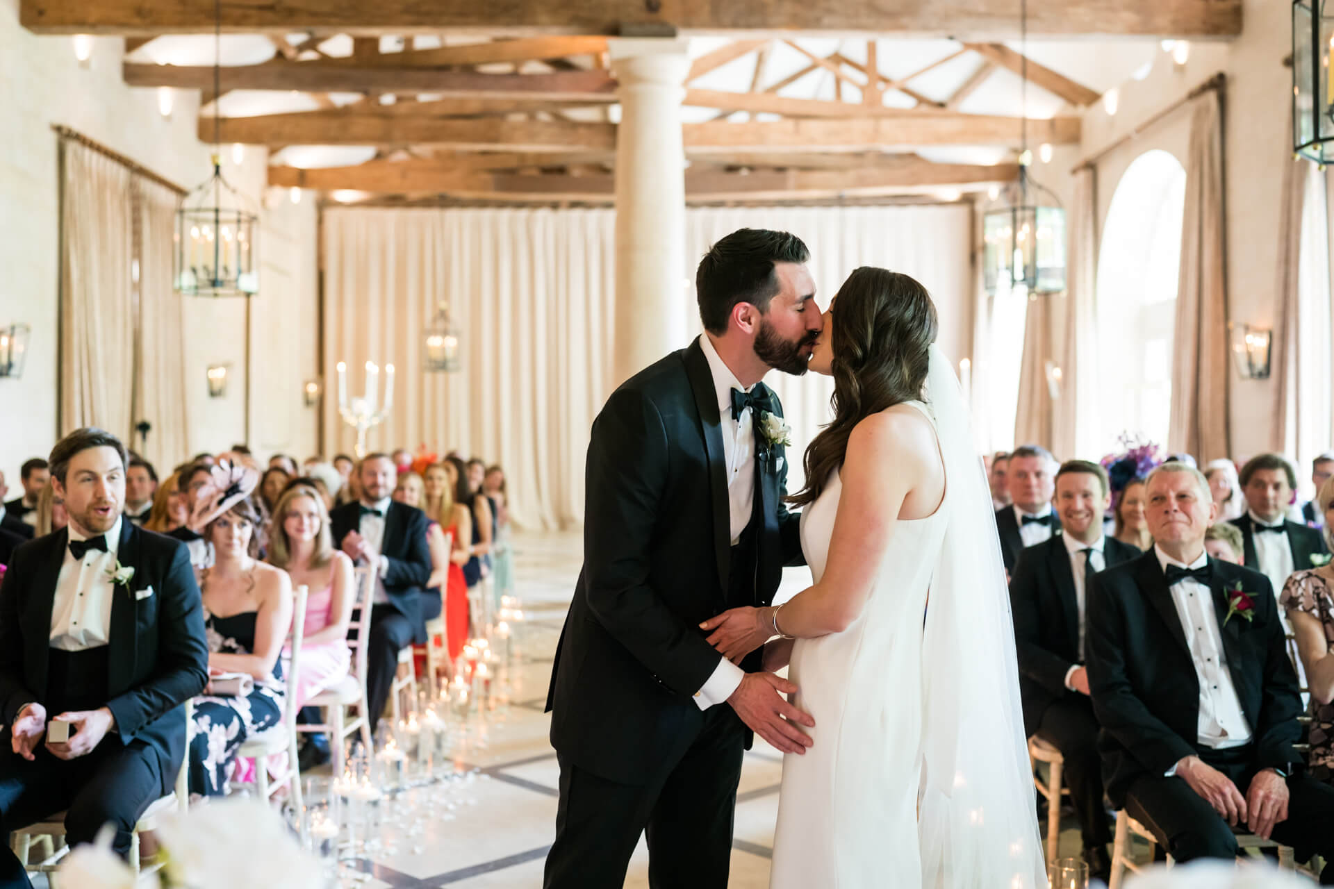 wedding couples first kiss at the orangery at Settrington