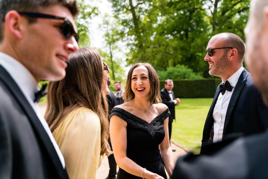 wedding guests chatting