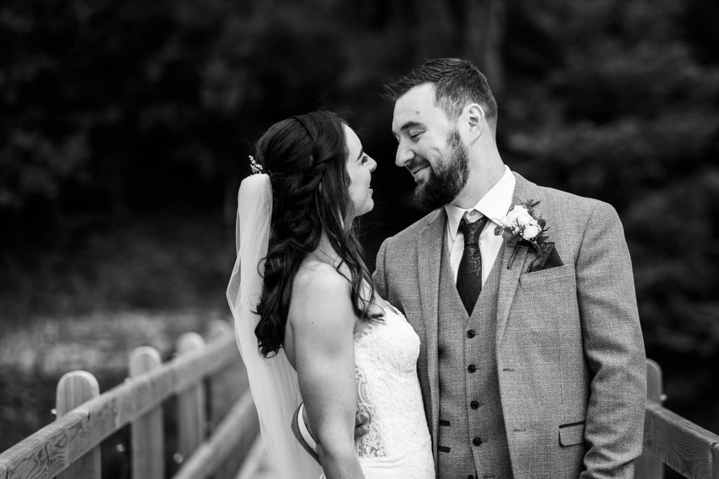 wedding couple looking at each other and smiling