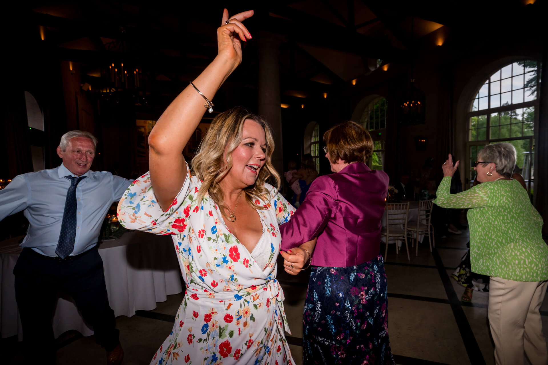 People dancing at joyful wedding event