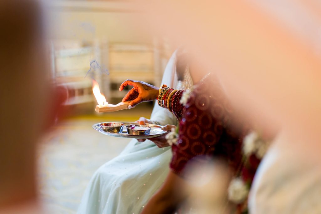 Traditional Indian ritual with fire and offerings.