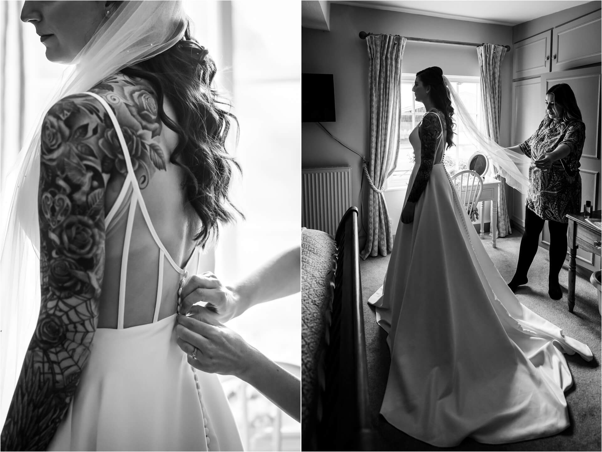 Tattooed bride preparing with help, monochrome warmth