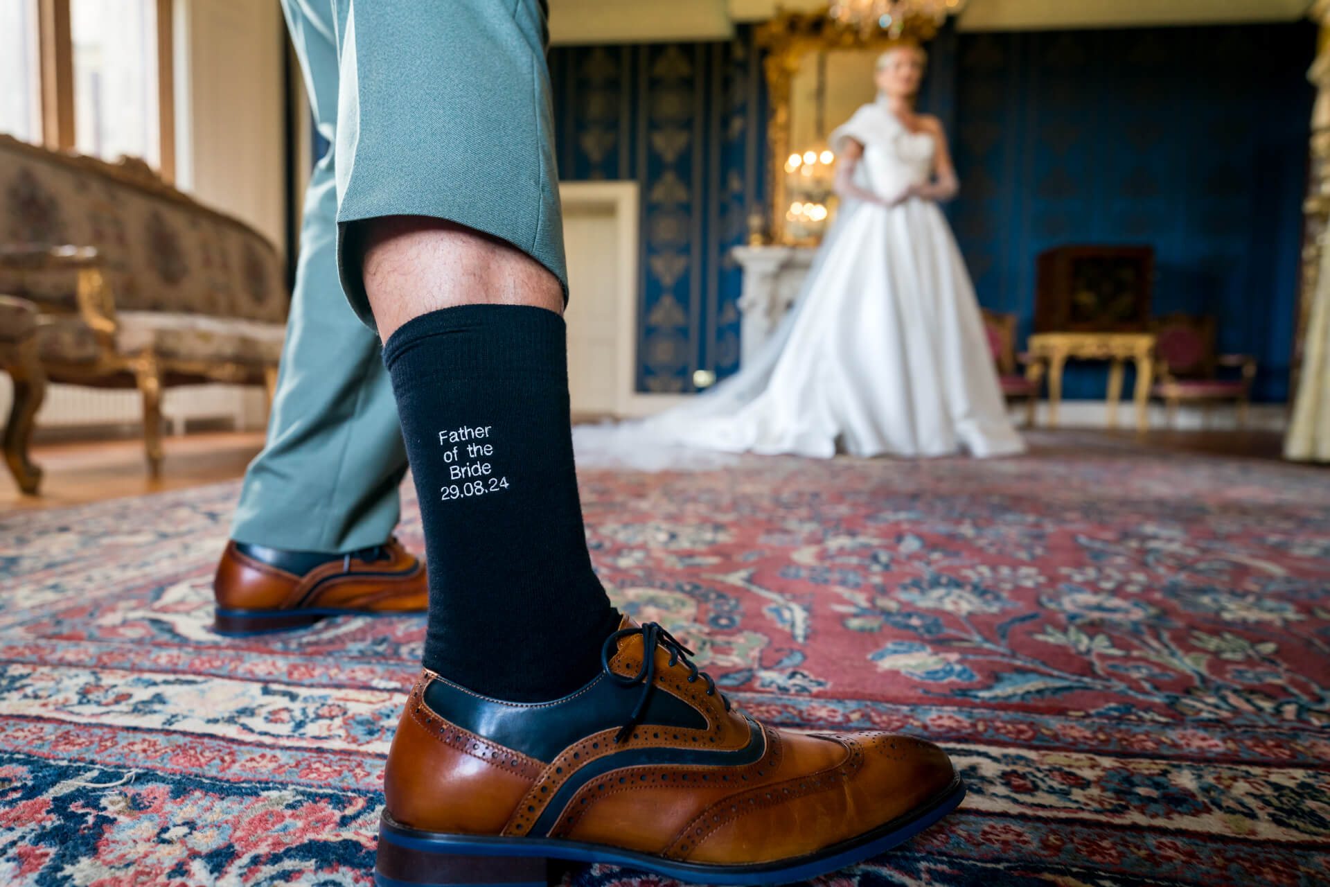 Father of the bride's special date socks at wedding