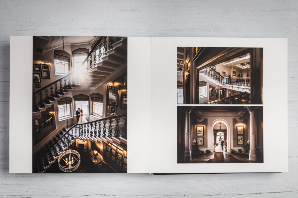 Luxury wedding album with staircase photos.